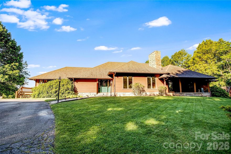 It’s all about the location—perched above the clouds like an island in the sky, this architecturally significant home by renowned architect Robert Moody captures sweeping long-range views and exceptional natural beauty.

Thoughtfully designed with enduring quality, the home offers 3 bedrooms, 3.5 baths, a spacious chef’s kitchen with butler’s pantry, and an inviting den. A stunning library with tray ceiling and custom built-ins, formal dining framed by expansive views, and four fireplaces create a sense of quiet elegance throughout.

The versatile lower level—with second kitchen and additional living spaces—offers flexibility for guests or extended stays. End-of-road privacy, no HOA or restrictions, and even a private helicopter landing pad add to the property’s distinctive appeal.

Set in one of Haywood County’s most special settings, the home enjoys peaceful surroundings and abundant wildlife, while remaining just minutes to dining and shopping with easy, paved access.

A rare opportunity to reimagine a well-built mountain residence in an exceptional location.