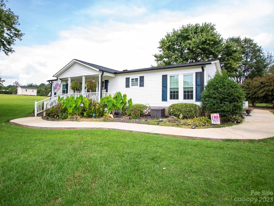 Welcome home to this updated 3 bedroom home nestled on 1.38 acres. Home features an open floor plan, a beautiful kitchen, large island with flat cooktop, and new cabinets. Roof, windows, and HVAC are all newly replaced. Large 1200 sqft detached workshop/ garage with bathroom and plumbed for HVAC. Come and take a look!