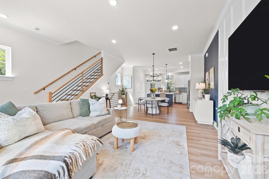 Custom, nearly new, and perfectly positioned in the heart of Oakhurst— this is not your average townhome.

Built just two years ago with every finish intentionally selected, this 3-bedroom, 3.5-bath home offers the elevated style today’s buyers are searching for— complete with customizations already in place. The open-concept main level features 10-ft ceilings, a bright, modern kitchen, spacious living and dining areas, and seamless flow ideal for everyday living or entertaining.

With nearly 1,700 square feet, this thoughtfully designed floor plan includes a private lower-level bedroom or office, an upper-level primary suite with en-suite bath and walk-in closet, plus an additional secondary bedroom and convenient upstairs laundry. Move-in ready with contemporary finishes, abundant natural light, and low-maintenance living.

Situated on a rare corner/end unit backing to trees, this home offers added privacy and one of the best locations in the community. Enjoy outdoor living with a balcony and rear porch, plus the convenience of a 2-car attached garage.

All of this just minutes to Plaza Midwood, Cotswold, and Uptown Charlotte, with easy access to dining, shopping, and entertainment—delivering the perfect blend of lifestyle, location, and modern design.