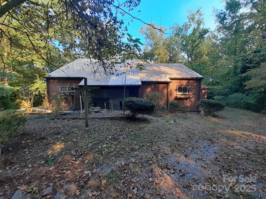 Amazing opportunity in Ellerbe! This contemporary home is nestled on a sprawling 1.75-acre lot and is set against the tranquil backdrop of Rankin Pond. This home has 3 bedrooms and 1 full bath. Just off the living room is a generously sized kitchen. The living room is centered around a fireplace with vaulted ceilings. The primary suite is on the main level with private access to a screened porch. The two remaining bedrooms are on the upper level.  Please see Agent Only attachments for First Look Period details. Offer Instructions are in the Agent Only Section.