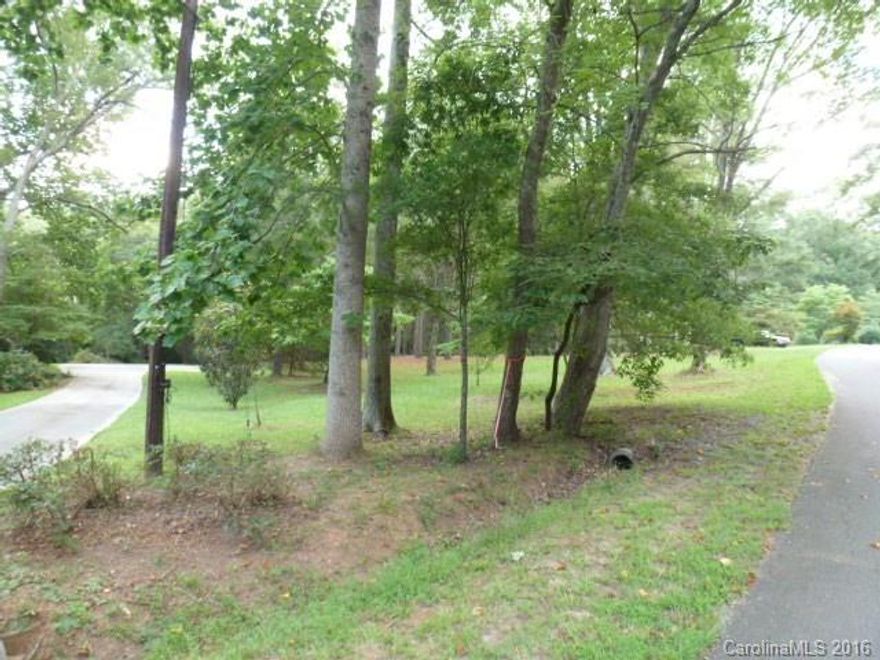Nice size lot in great location. Build your dream home on this .86 acre lot, county water and sewer available, Lot cleared.