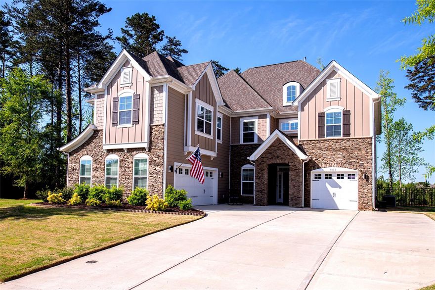 Gorgeous home awaits in the gated community of Bretagne. This 5 bedroom, 4 bath home with 3 car garage has exceptional curb appeal with beautiful landscaping, fully fenced rear yard with covered porch and more. Inside, enjoy an open-concept layout with oversized rooms, tray ceilings, hardwood floors, crown molding, and wood staircase with iron balusters. The gourmet kitchen features SS gas cooktop, wall oven, convection microwave, quartz countertops, white cabinetry, farm sink, breakfast bar, & butlers pantry w/beverage fridge. Speakers throughout create a relaxing ambiance. The great room is open to the kitchen and includes a cozy stone fireplace. The main level also offers a bedroom and full bath. The primary suite boasts a tray ceiling, spa-like bath with a walk-in shower and soaking tub, and an enormous walk-in closet. Three additional bedrooms, two full baths, a bonus room, and a loft provide plenty of space for everyone. The community pool and playground will impress ~ come see!