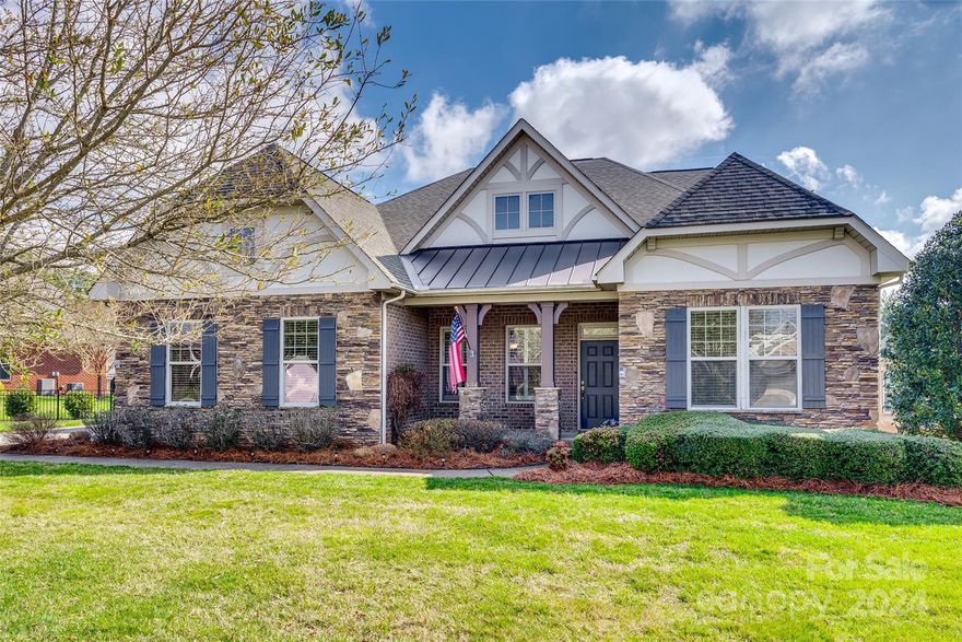 Full brick dream home in the desirable Barber Rock neighborhood in Indian Land! The exterior boasts timeless stone accents and a charming covered front porch, adding to the home's curb appeal. Step inside to an open floor plan flooded with natural light. The heart of the home is the spacious kitchen, complete with stainless steel appliances, granite countertops, a large breakfast bar for seating, a double oven, and a gas cooktop. All bedrooms feature generously sized walk-in closets. Upstairs, a versatile loft offers additional living space, perfect for a media room, or play area. One of the highlights of this home is the Archadeck all-season screened porch, where you can relax and unwind while enjoying views of the private, landscaped backyard. Barber Rock amenities include access to an outdoor pool, playground and more. Don't miss your chance to own a home in one of Indian Land's most desirable communities known for its top-rated schools and exceptional amenities.