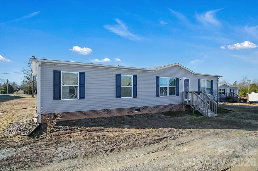 Must See - This well-maintained 3-bedroom. 2-bathroom 2022 manufactured Clayton Home offers modern comfort with the convenience you’ve been looking for. This home sits on a spacious .44-acre lot and features a fully fenced backyard — perfect for pets, play, or entertaining.

Inside, you’ll find stylish modern fixtures and an oversized kitchen island that anchors the open-concept living space, making it ideal for gathering and everyday living. Conveniently located near I-85, this home provides easy access to nearby shopping, dining, and commuting routes while still offering a peaceful setting.

Move-in ready and thoughtfully designed, this property blends functionality, space, and location seamlessly.