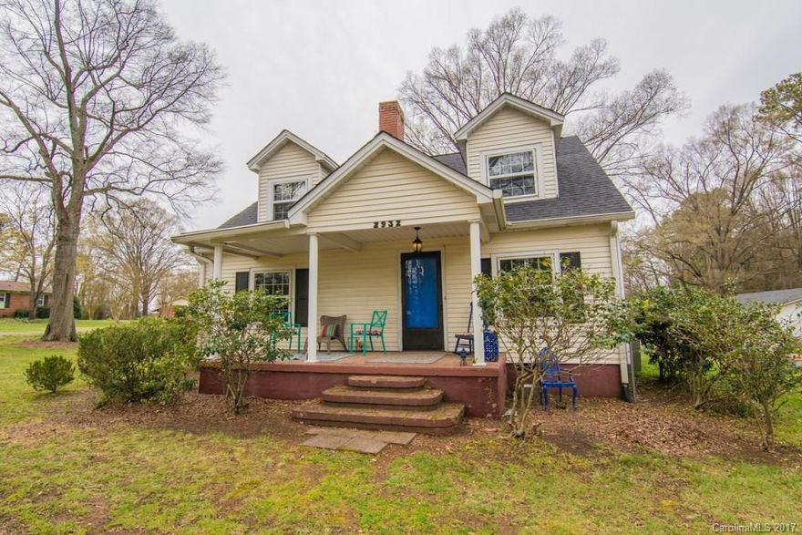 This recently updated home has a lot of character and sits on just over an acre! It has been freshly painted, has updated flooring all throughout, original Oak hardwood floors in the living room, a fireplace, dining room, a new roof on the main house (2017), an outbuilding and a shed for extra storage space, and a 2nd separate living area complete with a kitchen, W/D hook up, 2 bedrooms, and a full bath! Includes 3 parcels totaling 1.07 acres. All 3 parcels are on one deed.