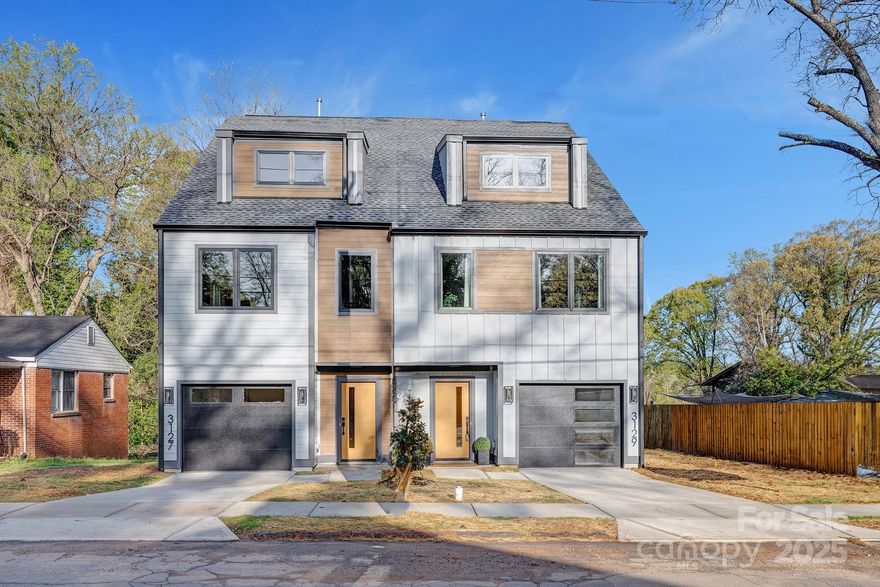 Step into luxury with this brand-new 3-story townhome by Northway Homes, perfectly situated in the heart of Charlotte! Boasting 4 spacious bedrooms, 3 elegant bathrooms, and soaring 10-foot ceilings, this home is designed for modern living. The gourmet kitchen features sleek countertops, custom cabinetry, stainless steel appliances, and a large center island—ideal for cooking, dining, and entertaining. The open-concept living and dining areas create a seamless flow, perfect for gatherings or relaxing evenings at home. Retreat to the primary suite, where a spa-inspired ensuite awaits, complete with dual vanities, a walk-in shower, and a luxurious soaking tub. Additional bedrooms provide ample space for family, guests, or a dedicated home office. Located just minutes from Uptown Charlotte, you’ll enjoy easy access to premier dining, shopping, and entertainment. Experience urban living at its finest—schedule your tour today and make this stunning home yours!