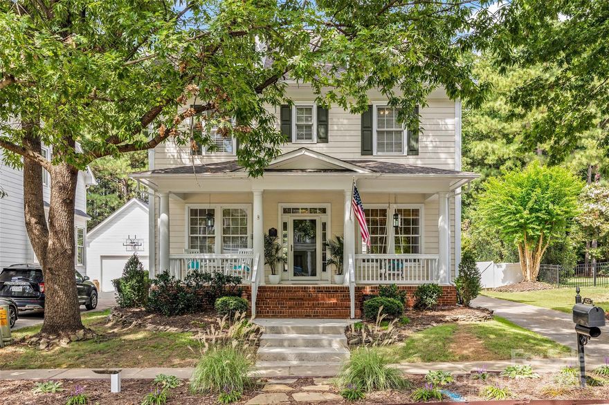 This classic two-story home with an inviting front porch is ready to meet you! As you step inside this home, you will see French doors that enclose a private office space and a formal dining room or a formal sitting room - your choice!  The open kitchen and living room is flooded with natural light and is a great space for family and friends to unwind, laugh, and share meals.  Outside, you will find a large deck with a built in space for a gas grill, a green space and a two-car detached garage all surrounded by a white fence.  Upstairs, there are 4 bedrooms including a primary suite with a bathroom with heated floors, a large custom closet, a walk-in shower and a soaking tub.  This home is not one you want to miss in charming Baxter Village.  From this special home to the wonderful amenities of this walkable community, your new home awaits!