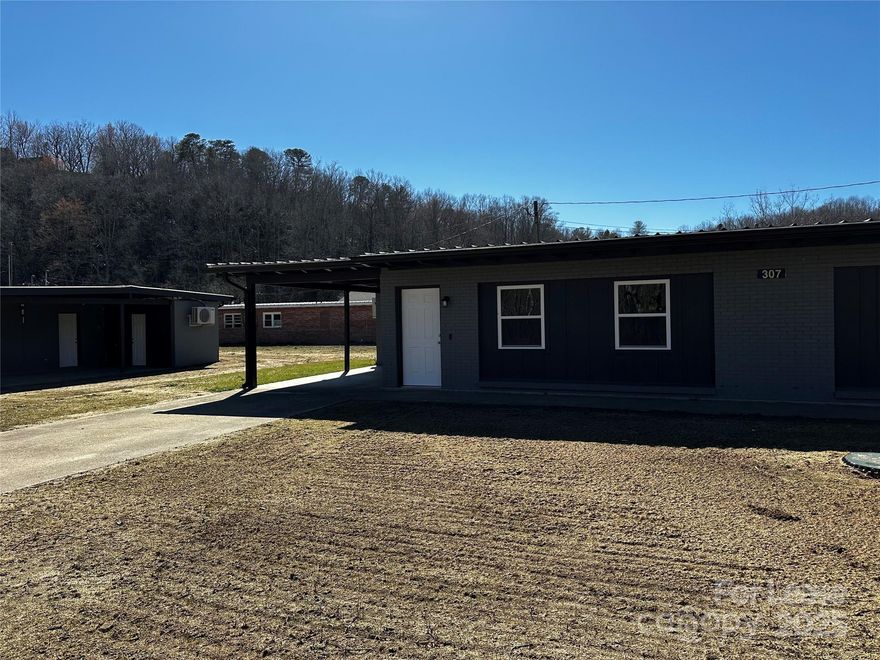 Ready for Immediate Lease! This well-appointed 2-bedroom, 1-bath duplex, conveniently situated on Hwy 70 West in Marion, offers a convenient commute to Old Fort, Black Mountain, and Asheville. The rental is fully equipped with modern appliances and includes comprehensive lawn maintenance and water. It is prepared for immediate occupancy, ensuring the utmost convenience for tenants. Prospective occupants are required to commit to a one-year lease and are advised that smoking and pets are not allowed. Additionally, all prospective tenants are required to complete the screening process, encompassing background, credit, and eviction checks, and must satisfy specific income criteria for eligibility.