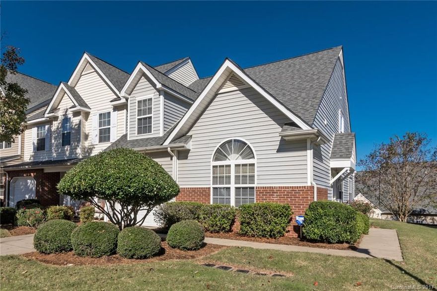Immaculate end-unit townhome just minutes from Ballantyne, I-485 and schools! This move-in-ready home features gorgeous granite counters & tile backsplash in the eat-in kitchen. Bright, open floor plan with vaulted ceilings, master on main, finished garage, like-new carpet throughout, tile in kitchen & baths, designer light fixtures and window treatments. Washer and dryer (only 2 yrs old) convey with the property. Residents enjoy a community pool, playground, walking trails & lawn maintenance.