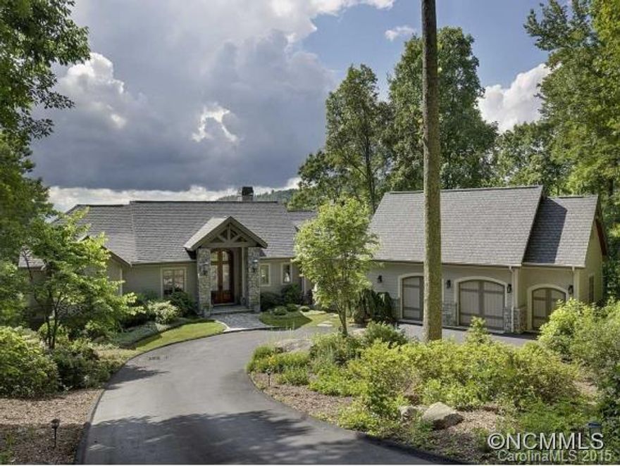 Custom built masterpiece w/ views to the Blue Ridge Pkwy & beyond! Home has Lutron lighting system, extensive sound system, state of the art wine room.  Statement making Great room w/ views from front door. Gourmet Chef Kitchen opens to dining area and 4 season room w/ fireplace & area for an indoor grill.  Home has 4 fireplaces, 2 offices, 2 master suites.  Additional 489 sf above oversized garage. Golf course rated 11th in NC & 5 miles to town.
