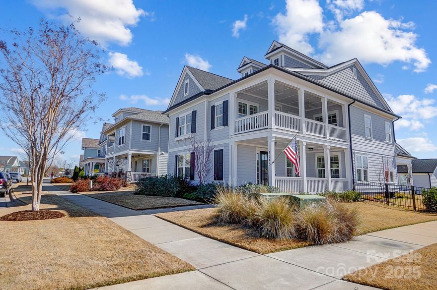 Extraordinary Charleston style home in amenity filled Riverwalk featuring the finest interior design selections. You won't find a model home more attractive. Open concept, light and bright kitchen and living areas. Plantation shutters throughout. Instant hot water heater. White kitchen cabinets, backsplash and quartz countertops frame a large island and gas stove. Ensuite bedrooms on each floor. Relax on the large upper and lower covered porches, or rear covered porch with double ceiling fans or the large patio. Enjoy the fenced and level rear yard, with detached three car garage. Immaculate and ready to move in.