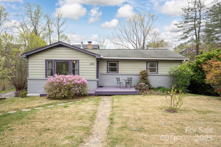 Modern meets mid-century in this West Asheville ranch-style home. Situated on an expansive 0.33-acre lot, and soaked in natural light, this spacious Malvern Hills home offers modern conveniences with period charm throughout. The 2015 addition offers all one would need — a flowing floorplan with a huge eat-in kitchen, four bedrooms plus a private primary suite, a large deck, and more. Pine paneling, updated windows, recessed lighting, custom built-ins, and a wood stove create a unique space that is quintessentially Asheville. Whether you're entertaining in the sizable updated kitchen, or soaking in the private outdoor hot tub, or gardening your heart out in the huge, open, flat backyard, this home features loads of potential. Imagine living minutes from all Asheville has to offer with five bedrooms, ample room for gardening, or a potential ADU. Comparable sales solidly show value at $700+. Walking distance to greenways and a short bike ride West Asheville restaurants and shops!