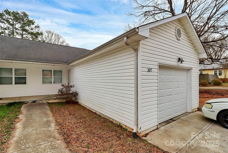 PLEASE KNOCK BEFORE ENTERING**** Investors and Savvy Home Owner Opportunity -  2 Bedrooms & 2 Bathrooms per Side!
Welcome to 307 and 309 McNeely, a multifamily duplex in the heart of Mooresville, NC! Offering two mirrored units, with 2 bedrooms and 2 bathrooms each, this property is perfect for investors or those seeking a live-in rental opportunity.

Units feature 2 bedrooms and 2 bathrooms each for maximum functionality, allowing you to live in one unit and rent out the other. Open-concept living areas, well-appointed kitchens with appliances, ample natural light and dedicated garage and drive way for storage and parking spaces assigned for each unit.
Spacious yard, ideal for outdoor activities, relaxing, cooking and entertaining.  A convenient location in the desirable Mooresville area, close to shops, restaurants, parks, and easy access to major highways, this home offers amazing potential for investors looking to expand their portfolio or owner seeking discounted mortgage.