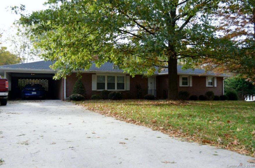 Excellent find in sought after Northwood Park. All brick ranch with basement and fenced-in back lawn. Single carport on main and single garage on lower. Partial remodel including custom cabinetry with pull out drawers and extensive tile work in master bath. Roof and windows have been updated. Don't miss out on this well cared for property!