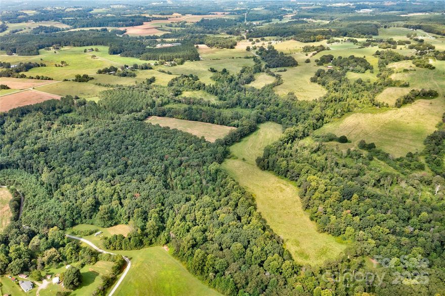Beautiful approx 40.51 acre parcel in countryside in Upper Cleveland County. Property is partially wooded & partially open pasture. There is a creek on the back portion of the property. County water is available. Septic tank would need to be installed. Property has road frontage in two different places (approx 405 ft & approx 346 ft). Perfect place to build your new dream home or possibly could subdivide for multiple homes. This is a must see!  Buyers agents welcome!