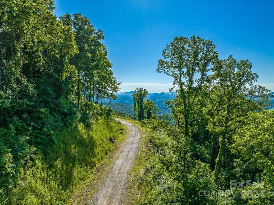 Over 10 acres in the coveted gated community of The Summit Of Asheville. The feeling of being remote and away from the hustle and bustle, yet convenient to the Interstate and amenities, and just 20 minutes from downtown Asheville. This amazing property has great views and an POA of only $100 month! This community offers a community garden as well as extensive walking trails. Horses allowed. Gate code required for access.