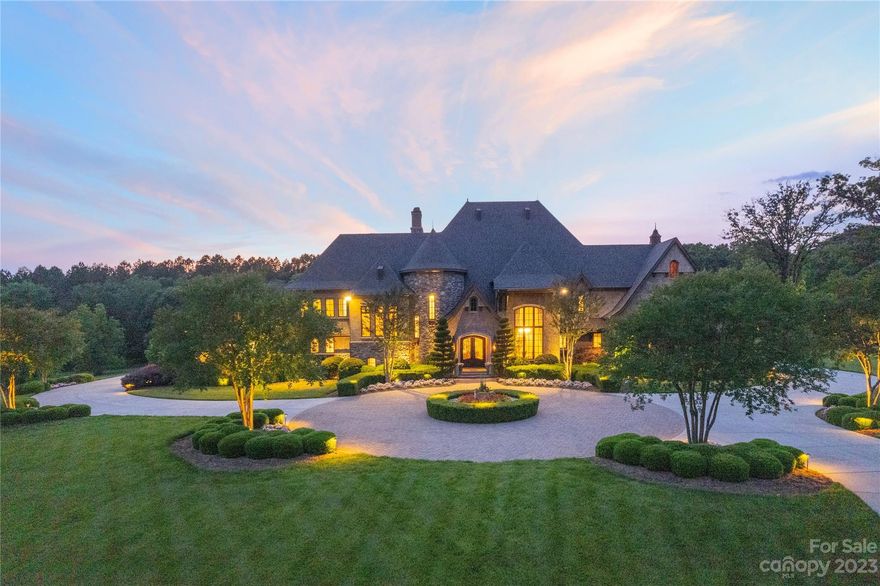 LUXURIOUS MASTERPIECE CUSTOM BUILT BY AUGUSTA HOMES SITUATED ON 5.83 ACRES- GATED COMMUNITY-RESORT STYLE ZERO ENTRY POOL WITH 70 FT SLIDE, GAS FIRE PIT INSIDE POOL- HOT TUB- DIVING BOARD- 6 BUILT IN HEATED JET SEATS- MULTIPLE DEPTH ZONES- TRAVERTINE POOL DECKING- 
STUNNING KITCHEN INCLUDES THERMADOR 5 BURNER INDUCTION COOKTOP- DOUBLE CONVECTION WALL OVENS- DOUBLE ISLANDS - 2 SINKS- 2 DISHWASHERS- THERMADOR DOUBLE REFRIGERATOR- POT FILLER- 
SOARING GREAT ROOM W/COFFERED CEILINGS- LARGE STACKED STONE FIREPLACE- BUILT INS- OWNERS SUITE HAS SEPARATE AIR UNIT FOR OPTIMAL TEMPERATURE CONTROL, MOTORIZED WINDOW TREATMENTS, PRIVATE PORCH ENTRANCE- OWNERS BATH INCLUDES DUAL VANITIES, HEATED FLOORS, SOAKING TUB, MULTIPLE SHOWER HEADS- LOWER LEVEL PROVIDES CUSTOM POKER ROOM DESIGNED AFTER MGM IN VEGAS- FULL KITCHEN, GOLF SIMULATION ROOM- SPACIOUS GREAT ROOM W/STONE FIREPLACE- BEDROOM/BATH-SAUNA-
2- 75 GALLON WATER HEATERS, WATER FILTRATION SYSTEM- 2 HUMIDIFIERS MAIN/OWNERS SUITE
NEW ROOF 2023