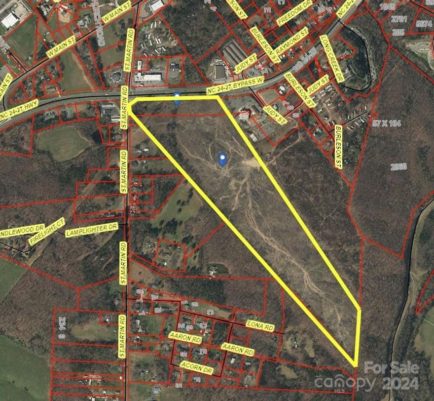 *Back on market - no fault of seller* High traffic parcel located at the intersection of Saint Martin Road and Hwy 24/27 West Albemarle. 1185 feet of total Road Frontage - 955 feet along 24/27. Property has multiple zonings.  Road Frontage is zoned R-10 (City of Albemarle) and includes about 5.09 acres.  About 11.4 acres - Zoned County R-20 and 40.86 Zoned County RA.  According to Utility Maps, water lines run along St Martin Road and Sewer lines run along front of property on 24/27 (tap fees required).  See Commercial Listing - MLS # 4107854