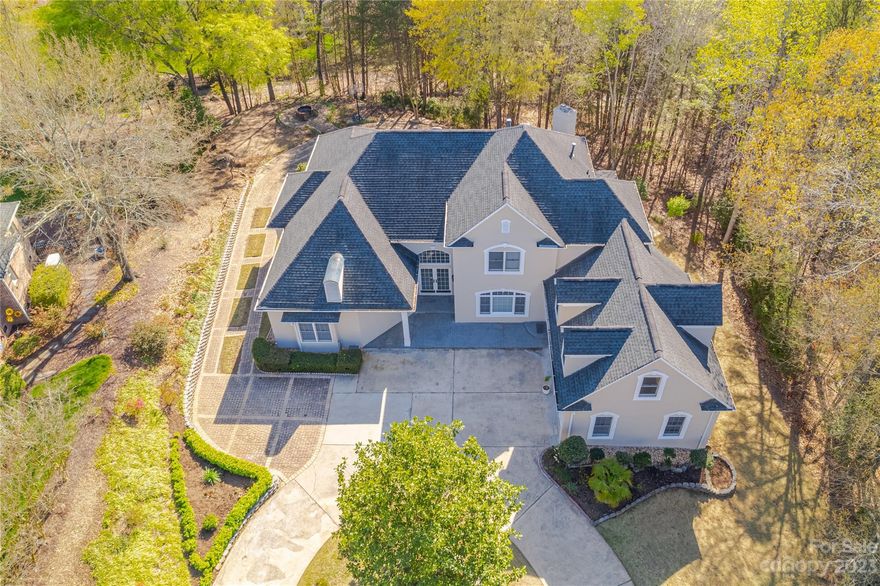 Get ready to fall in love with one of the largest open floor plan in Riverpointe Community. The manicured lawn and circular driveway take you to the front door that opens to a huge 2-story cathedral ceiling great room with sprawling natural light. The great room also has a wet bar - perfect for entertainment. On this spacious main level, you will find a spacious kitchen, family room, dining room, owner's ensuite and a guest bedroom with a full bathroom. A large deck off the great room offers peaceful view over private wooded area. On the second level, there are 2 bedrooms, a full bath, and a large multipurpose room. There is also a finished basement which features an additional bedroom, a full bath, and a living room with a fireplace. So much space and possibility in this property--a must see to appreciate!