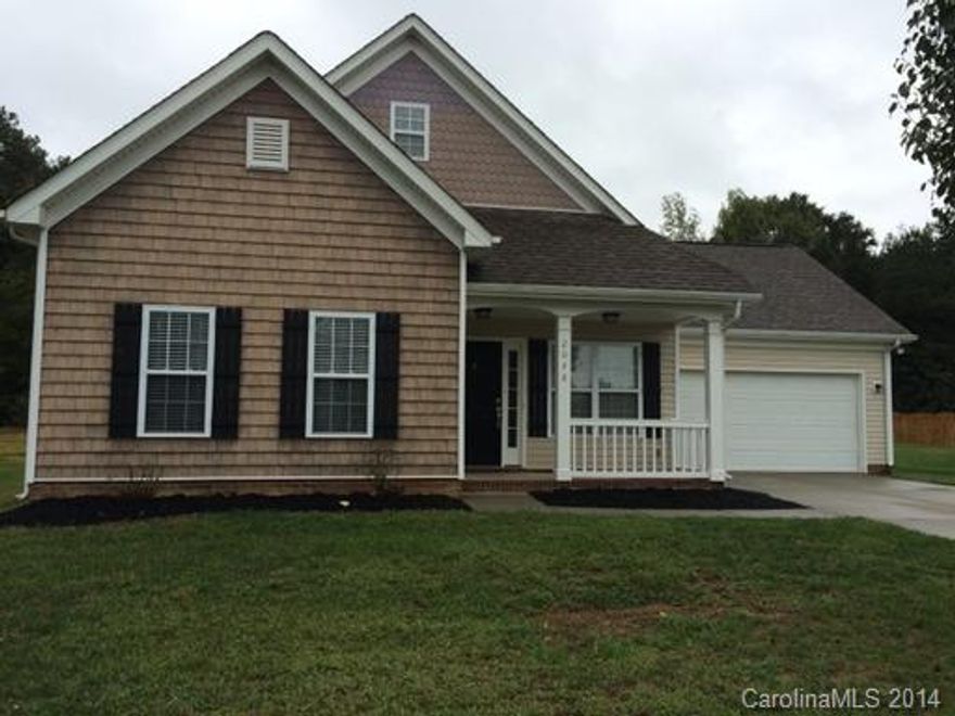 This lovely home has vaulted and trey/coffered ceilings, a breakfast area and a Great Room. The warm and inviting kitchen comes with all the appliances plus a pantry. The laundry room is located on the first floor. The Master Suite has a walk in closet and the Master Bath has an over sized tub. A patio leads you out into a well manicured back yard.
