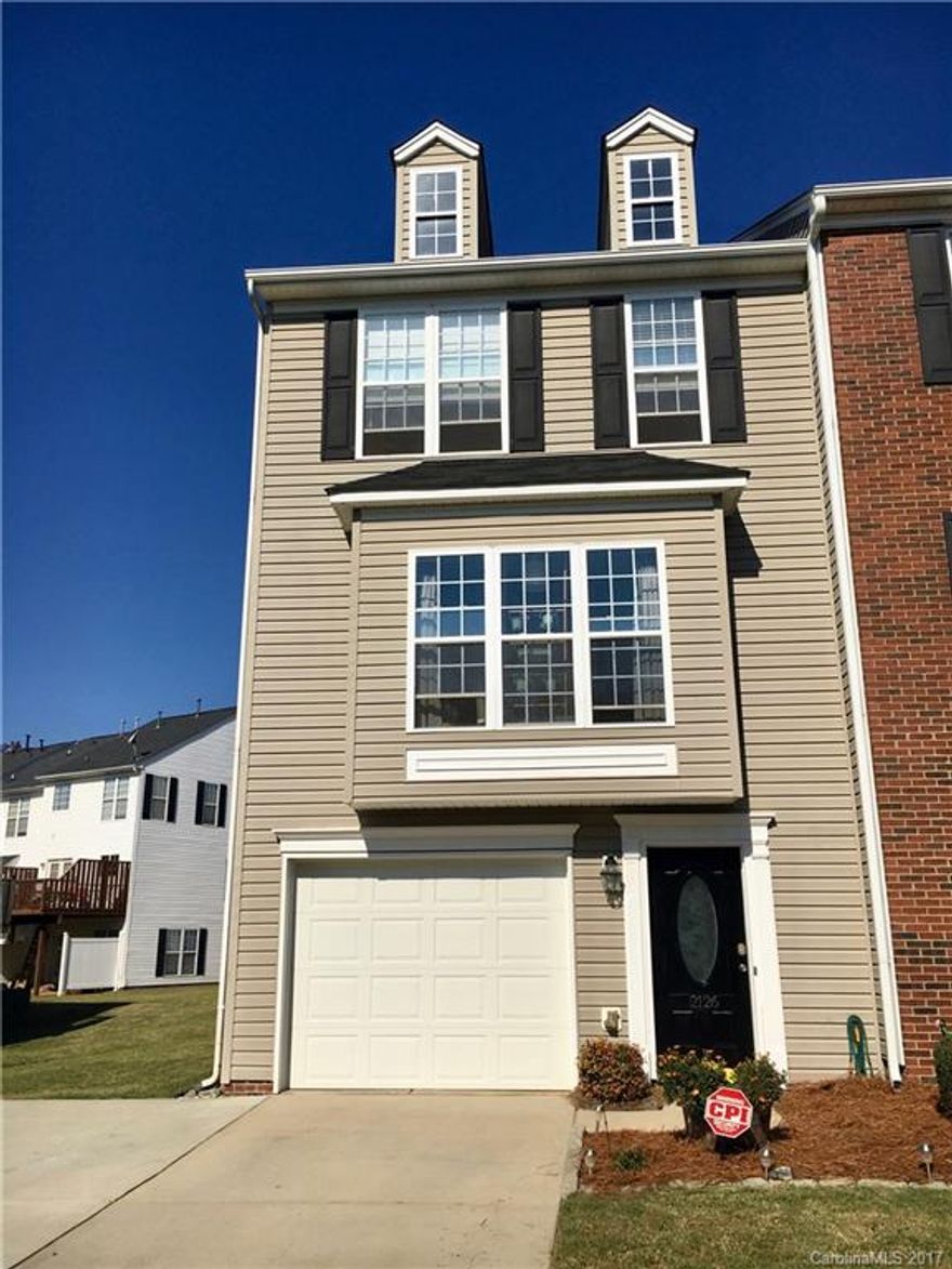 Awesome end unit townhouse with 1 car garage. Must see chef's kitchen featuring huge butcher block island with seating, subway tile, double oven, white farm sink, upgraded lighting, chalk wall, SS fridge and laminate flooring.
GR is bright and open w. french doors to to balcony. Dining area is defined by decorative columns. Don't miss the designer 1/2 bath! Master has vaulted ceiling, walk in closet; bath double sinks, soaking tub and sep.shower. Lower level rec.room. New carpet!