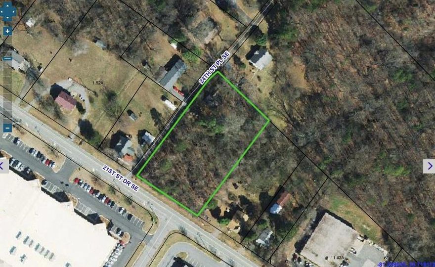 Corner lot with good road frontage on 24th ST DR SE. Home on the property has been abandoned for years and is listed at no value. No city taxes!