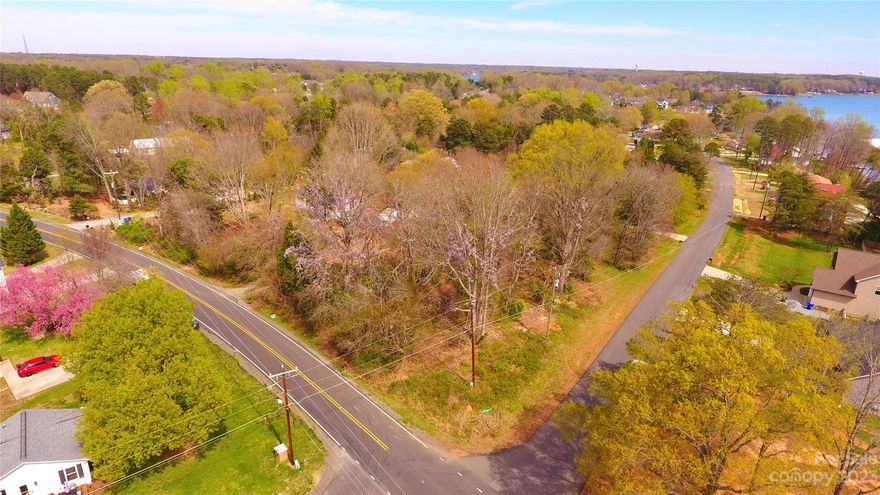 Build your "dream home" on this over a half acre, level, wooded corner building lot in a very desirable area of Mooresville.  Excellent Location close to Golf, Shopping, Restaurants & Stutts Marina w/Low Iredell County Taxes & Award Winning Schools. NO HOA Fee.