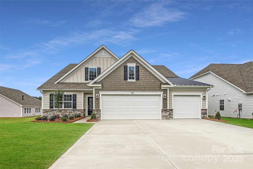 This new single-story Harper floorplan combines elegance and comfort. An open-plan layout connects the modern kitchen, dining room and spacious family room, which features a door providing direct access to the covered patio. A formal living room off the foyer is ideal for hosting guests. The sprawling owner’s suite with a private bathroom and a secondary bedroom are situated on opposite sides of the home for enhanced privacy. A desirable three-car garage provides ample storage space. Plus, our signature Everything's Included program means you will get a gourmet kitchen with double ovens and cooktop, quartz or granite kitchen countertops, subway tile backsplash, ceramic tile, luxury vinyl plank flooring, and a gas fireplace (per plan) at no extra cost! Harris Mill located in a sought-after Indian Land, offers luxury homes and quarter acre and wooded homesites.