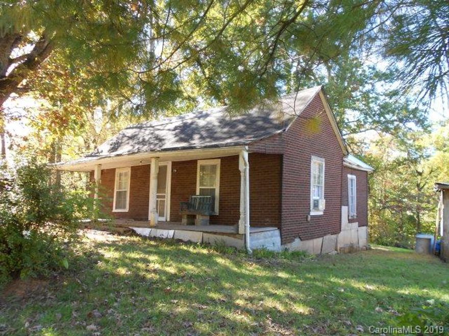 House in the circa of 1900, 2 Bedroom, 1 Bath, living room, and Kitchen.  Well is on the back porch, just outside the city limits with 2.16 acres.