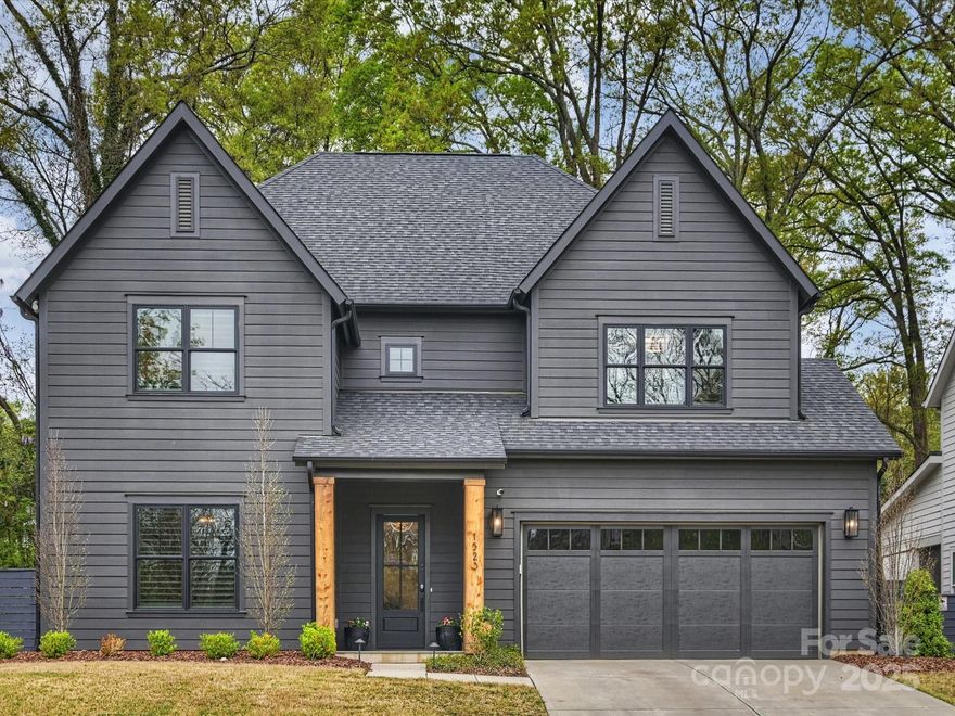 Nestled on a quiet street, this stunning, like-new home offers the perfect blend of tranquility and convenience in popular Plaza Midwood. Covered entryway w/bluestone patio welcomes you into the beautifully designed, open concept floor plan with 10ft ceilings. Office/bedroom w/custom built-ins connects to full bathroom. Gourmet kitchen with expansive island opens into living room featuring gas fireplace, shiplap detail, & built-ins. Scullery features bar sink, beverage fridge, open shelving, & additional cabinets. Custom bluestone screened porch overlooks professionally landscaped backyard. Drop zone leads to 2-car garage. Upstairs features 9ft ceilings. Huge primary suite boasts spa-like bathroom & 120+ sq ft closet. Large bonus room, bedroom, full bath, bedroom w/en-suite, & laundry room w/utility sink. Despite its peaceful setting, this home is just a mile away from some of the best restaurants in the city, along with all the vibrant entertainment that Midwood has to offer.