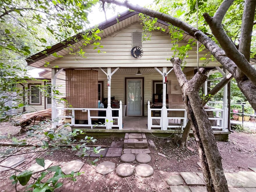 Welcome to your enchanted forest oasis where nature, charm, and opportunity come together on over half an acre. Tucked beneath a canopy of trees and surrounded by fruit and berry plants, this property feels like a hidden retreat with unlimited potential.
The updates are already in place for peace of mind: a brand-new HVAC (2024) keeps things comfortable year-round, the metal roof has been revamped and freshly insulated, and the well pump provides your water supply. Inside, the Weatherization Assistance Program has already handled the attic cleanup and added new insulation, so you can move in with confidence.
Accessibility is built right in with an 80-foot front ramp & another ramp out back, while the sprawling yard offers endless possibilities from gardens and play spaces to outdoor entertaining under the trees.
If you’ve been searching for a place that blends privacy, character, and the magic of nature, this one is ready to become your personal sanctuary.