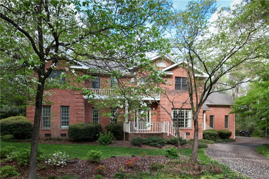 Wooded 1-acre lot. Stunning custom home. Impressive entry&open plan. Hardwoods&design elements. Large GR w/ FP, study, open views. Butler panty/formal dining room. Kitchen features hardwoods, granite& furniture-like island/gas cooktop. SUNNY breakfast nook. Porch is the perfect place to relax. BR&bath on main!  Upstairs den&bonus. Master features sun-room/nursery;  opens to a private office. Huge mstr bath-double-vanity, tub, walk-in shower. 2/3 bedrooms, J&J bath. Newer roof, HVAC.