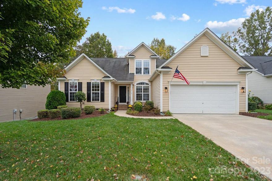 Imagine making this gorgeous home your own. Upon entry enjoy beautiful, gleaming hardwood floors. Open floorplan. Full of natural light.  Formal dining room.  Corian countertops in kitchen. Upgraded with new SS appliances and new fixtures. New hot water heater.  Spacious primary bedroom on main with walk-in closet, and private ensuite including his and her sinks. Split bedroom concept. Upstairs bedroom has private, full bath. Perfect for guests. Sunroom w/ direct access to deck. Wooded backyard view. In-ground 6-zone irrigation system.  Low SC taxes.  Award-winning Fort Mill schools. Quick access to Charlotte, surrounding cities, shopping, and recreation.  The current owner's mortgage is VA loan and is ASSUMABLE by another veteran using their VA certificate. Assumable Rate is: 2.875%.  Seller offering BUYER CREDIT or seller paid closing cost of $5000 to buyer.