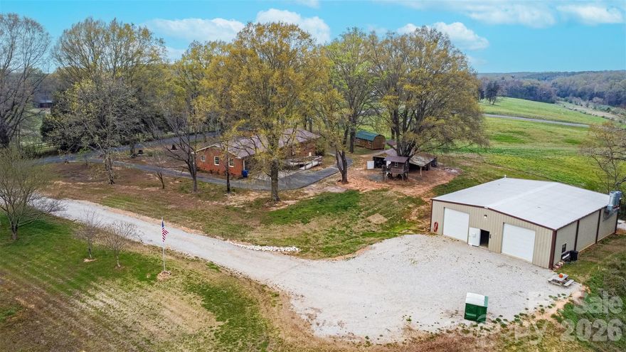 Beautiful 7 acres of land out in the peaceful country! Has Huge auto body shop with heat and a paint booth that's 3,000 sq ft and only 5 years old! The main home is a one story ranch that's comfy and cozy with a great floor plan. Home needs updates and TLC! Sold As Is, but has so much potential!