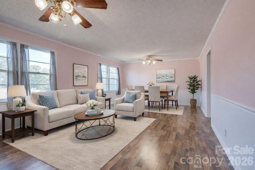 100% USDA Eligible Financing available! Check out this Sprawling 4 Bedroom 2 bath full brick ranch home in the country. It is situated on a 1.9 acre lot with No Restrictions!  If you're looking for an amazing property that includes huge Garage this could be it. The 30 x 40 garage also has a 10 x 40 lean-to in the back. The perfect place for your in-home business, Car enthusiast,  handyman. The home has a newly installed Farmhouse style kitchen with tons of cabinets, beautiful butcher block countertops, farm sink and new stainless-steel appliances. There is a large laundry room with plenty of counter space, sink & cabinets as well.  If you love to entertain there is plenty of room with a large family room, Dining room & formal living room. The home has newly installed laminate flooring, freshly painted, crown moldings throughout, Wood burning fireplace and tons of closet space. The 2-car carport that has been enclosed for extra storage space. This beauty won't last long call today for an appointment.