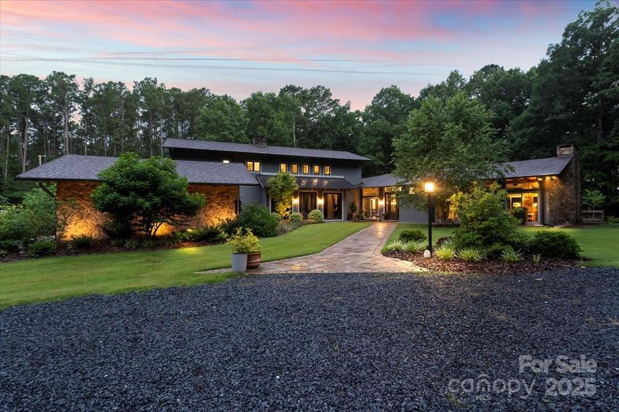 Imagine waking up in a home that feels like a retreat. Morning light spills through oversized windows, illuminating warm hardwood floors. In your sun-drenched kitchen, you sip coffee before stepping outside to 25 private acres, a serene pond reflecting the sky, and the peaceful sounds of nature. Peace isn’t something you seek—it’s woven into every inch of this estate, built with legacy in mind by Lt. Governor Bob Jordan and his wife, Sarah. This home isn’t just a house; it's a place full of thoughtful details, elegant finishes, and spaces designed to be lived in and loved. Enjoy a swim in the 1,700 sq ft indoor heated saltwater pool, a moment in your private sauna, or a walk around the pond as the sun sets. With five bedrooms, 5.5 baths, and three luxurious primary suites, there’s room for everyone. Minutes from Lake Tillery and Uwharrie National Forest, the adventure is close—but the true magic is right here at home. This is more than a house—it’s where you truly belong.