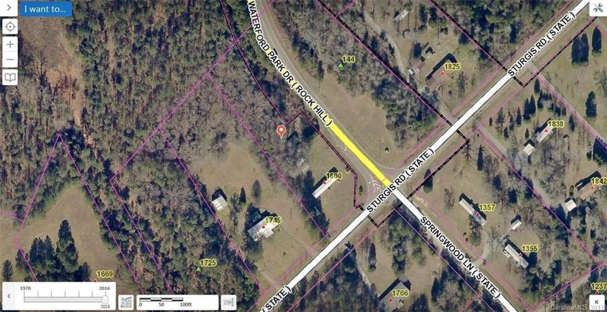Partially wooded property on the corner of Sturgis Road and Waterford Park Drive with over 300 feet of frontage.  Zoned RUD.