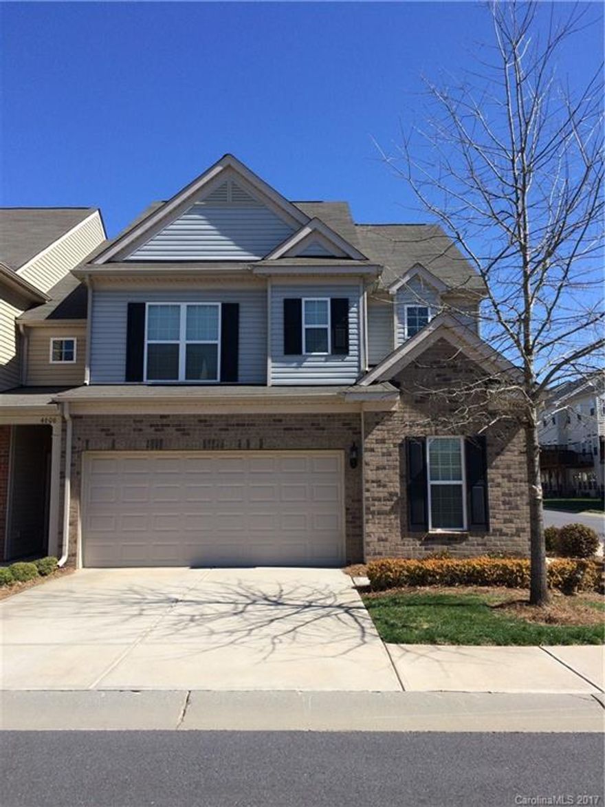 Located in the highly sought after area of SouthPark. Very close to a lot of shopping, restaurants, businesses, and light rail. This gated community is full of amenities including pool, fitness center, and dog park. Spacious end unit on  a corner lot offers more light. Fenced back patio adjacent to sunroom offers privacy. Inside you'll find a meticulously maintained and upgrade filled home: granite counter tops, hardwood floors, tiled bathrooms & kitchen back splash, crown molding to name a few.