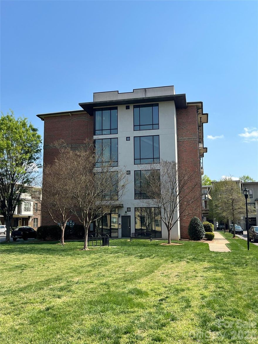 Don’t miss this beautifully maintained one-bedroom condominium ideally situated just a few blocks from NoDa and 36th Street! This home features an open-concept living and kitchen area, perfect for both entertaining and everyday living. The kitchen is well-appointed with granite countertops, a breakfast bar, and ample cabinet storage. The primary bedroom offers abundant natural light, spacious closets and direct access to a full bathroom. For added convenience, a washer and dryer are included!
Included in monthly HOA dues are water, sewer, and trash services; as well as Spectrum high-speed internet and cable. All that has to be covered is the electricity! There is plenty of on-street parking available and code entry into the building for added security. This condo is in the center of it all with just a short one-minute walk to North Charlotte Park, ten-minute walk to NoDa’s restaurants, nightlife, cafés and fifteen-minute walk to the light rail station with easy access to Uptown Charlotte!
This is an exceptional opportunity to enjoy comfortable living in one of Charlotte’s most vibrant neighborhoods!