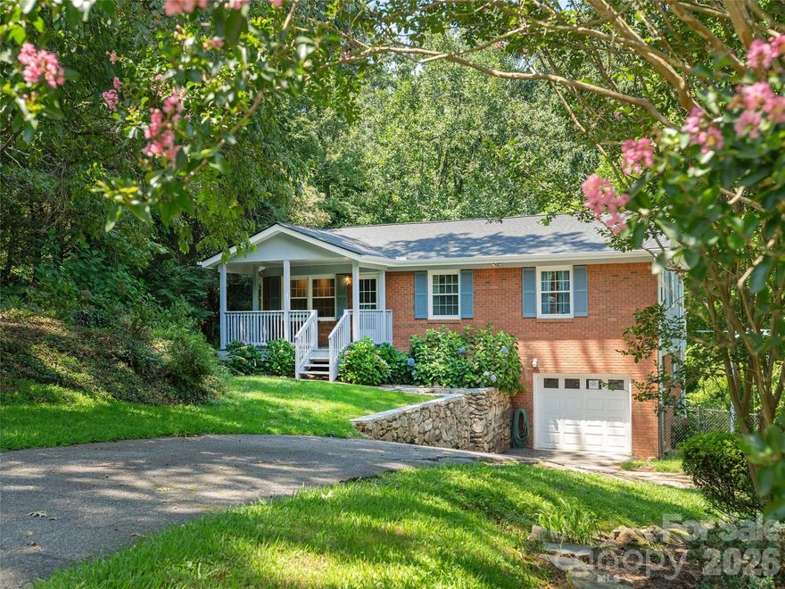 *PRICE REDUCED AND MOVE-IN-READY*  Come now to see this pristine 3 Bedroom 3 bath home with a full walk-out basement ON .68 ACRES.  Multiple new features including a brand new 2025 architectural shingled roof, a new furnace & air handler in 2023, new covered front porch, new hardwood floors, fresh paint inside and out, new gutters, plus a ONE-YEAR HOME WARRANTY. Enjoy the spacious living room and dining area, flowing into the 4-season sunroom with cathedral ceiling and skylights. The light and bright family room features new laminate flooring, free-standing gas logs with bricked surround, and a 3rd full bath close by. Relax on the expansive (composite) deck, with lots of room for grilling out with family and friends while overlooking the woods and creek below. The private open yard space, completely fenced-in, offers room for a garden or play. An oversized garage has outside access and lots of room for storage. NO HOA OR RESTRICTIONS provide additional freedom and flexibility. NEWLY PAVED STATE-MAINTAINED ROAD. A well-located gem only minutes from all conveniences, eateries, retail and grocery shopping, schools, and healthcare.