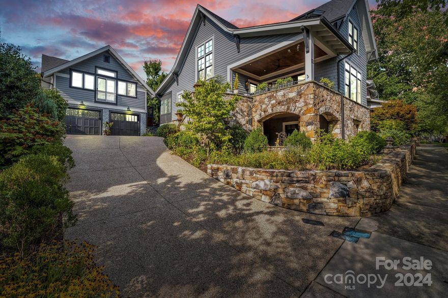 Incredible attention to detail makes this home one of a kind. All the convenience of a walkable neighborhood without sacrificing privacy. Outdoor spaces on nearly every side of the home: covered stone front porch (cleverly hidden from street view), private stone backyard patio with tall fireplace and built-in grill. Perfect lines of sight enable the main level to maintain a light, bright feel. Gourmet kitchen with 36" paneled refrigerator and 36" paneled freezer, customized storage, and stunning quartzite counters. Having the primary suite on the upper level allows for year-round, long range mountain views from every window. Another private porch off the suite faces sunsets. En suite bathroom has radiant heated floors. Bright lower level houses guest quarters, offering privacy and another outdoor patio space. Separate garage has 598 sqft apartment. Other features: sound insulated floors, large kitchen pantry, whole house generator, motorized shades. Gas fireplace has full flue.