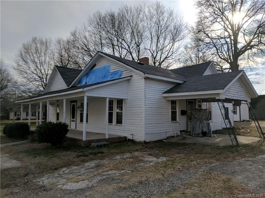 updates 5 years ago included replacement windows, roof, toilet and tub, no central heat/air, owner will leave existing window units, gas water heater in aqua hut, storage building to be removed, due to a recent electrical fire the home has no power, cannot restore power without electrical updates, carpet was removed after the fire, fire was in attic area and caused damage to gables, roof appears to be in good condition