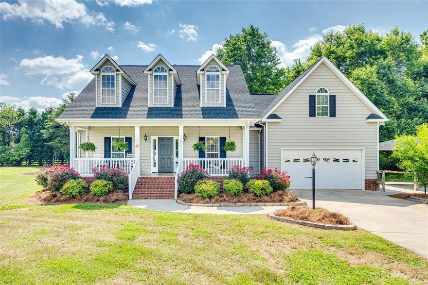 Welcome HOME!  This spacious 3 bedroom 2 bath home sits at the end of a quiet culdesac on approximatley an acre.  You'll be able to move right in and appreciate the recent updates such as flooring and paint.  And you will LOVE the beautiful fireplace anchoring the high ceilings in the living room.  The primary suite offers a built in closet system.  The home features a finished bonus room over the garage with many options for potential use as well as a fun room off the back of the home that recently served as a playroom. The covered outdoor entertainment area is ready for you to welcome guests this summer.  Enjoy quiet country living with a convenient location!