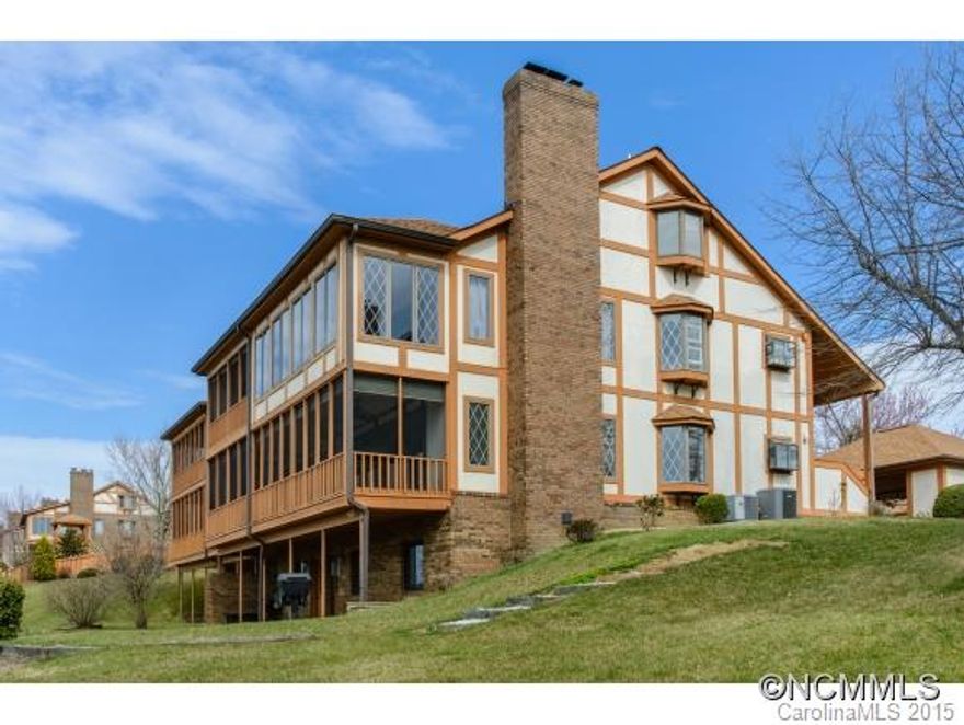 Beautiful long distance mountain views from this first floor condo sited to enjoy the sunset, and views of Etowah Valley, cold mountain & Mt. Pisgah. Many upgrades--HW & tile floors, plantation shutters, built-in bookshelves in Family Rm & Living Rm, 2 BRs, 3 Baths, 2 bonus rooms & walk-out lower level.There is a Club house with pool and a very active social group.  See this condo today! You will be glad you did.