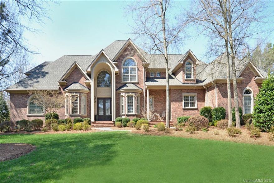 Stunning custom home on acre lot. Outdoor oasis w/in-ground salt water pool & hot tub, outdoor kitchen w/ Viking grill, fridge, two-eye burner & built-in deep fryer, fenced yard, screened porch & covered veranda. Marble floors, detailed mouldings, chef's dream kitchen. Viking appliances throughout, Sub Zero refrigerators in kitchen. Security system w/16 cameras. Billiards room w/Viking Kegerator, fridge, ice machine & wine cooler. Master on main, beautiful paint details and exercise rm w/sauna.