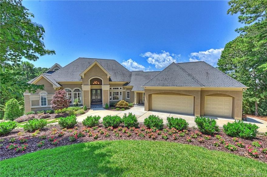 Beautiful newly renovated lakefront ranch full of luxury finishes with open light-filled entertaining spaces.  Absolutely move-in ready home featuring a dream chef's kitchen with large island, walnut cabinetry & limestone hood, gleaming marble & limestone floors on main level, custom limestone fireplaces & walkout basement with wine cellar, 2nd kitchen & theater room. Relax in an outdoor oasis with pool & hot tub, outdoor fire pit, slate terraces, & private pier with built-in seating!