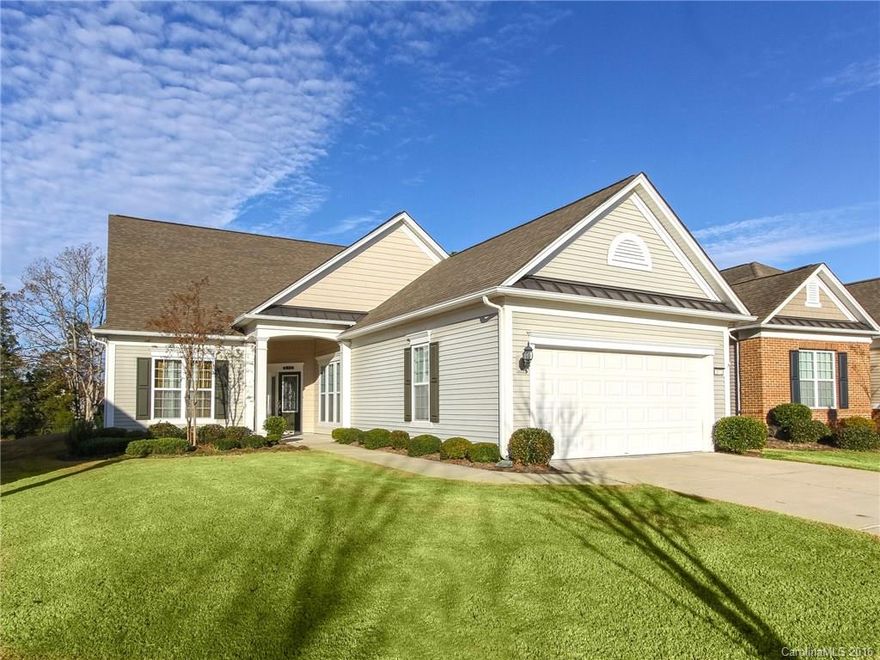 Popular Surrey Crest Loft features 3BR/3BA, sunroom, office and sits on a private wooded lot with a winter view of the lake.  Interior has hardwoods on the main floor, granite counters, tile backsplash, stainless appliances, gas stove, ceiling fans and much more.  The garage has the 4ft extension, workbench, epoxy floor and 12x18 attic storage. Come check out the community and the active adult lifestyle of Sun City Carolina Lakes.