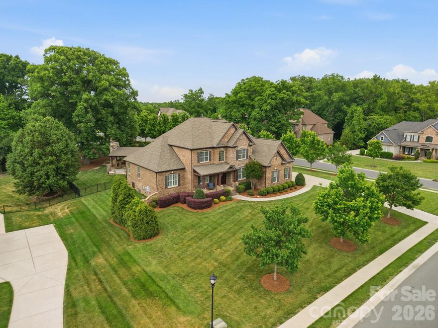 Nestled on nearly one acre in the sought-after Bromley community, this exceptional home offers the perfect blend of luxury, space, and lifestyle—served by the highly rated Weddington schools and featuring low Union County taxes.

Designed with both everyday living and entertaining in mind, the open floor plan showcases a stunning two-story great room with fireplace, wood detailed coffered ceiling and abundant natural light. The expansive kitchen is a true centerpiece, complete with a large center island, upgraded 6-burner gas cooktop, generous walk-in pantry, and seamless flow into the breakfast area and sunroom.

The main level features a luxurious owner’s suite with two spacious walk-in closets and a spa-like bath with wood beam ceiling detail, oversized walk-in shower and garden tub, along with a flexible guest bedroom (currently used as office). Additional main-level highlights include formal dining, a versatile living room or office, and large convenient laundry room.  

Upstairs, you’ll find three additional bedrooms, including a private ensuite, plus a large bonus room with its own half bath—ideal for a media room, playroom, or flex space.

Outdoor living is where this home truly shines. Enjoy the expansive travertine paver patio, built-in grill with beverage fridge, and a detached covered patio with fireplace—perfect for year-round entertaining. A custom putting green adds a fun and unique touch, and the property is already ideal for adding a future pool.

Complete with a 3-car garage and thoughtful upgrades throughout, this home offers an incredible opportunity to enjoy refined living in one of the area’s most desirable and PRIME locations.  Conveniently located near South Charlotte, Waverly, Rea Farms with easy access to I485, commuting to Ballantyne, Southpark, Uptown Charlotte or Charlotte Douglas International Airport.
