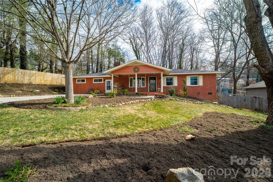 Welcome to this beautifully refreshed 1969 Royal Pines ranch, where classic character meets thoughtful modern updates—and where flexibility opens the door to income opportunities or multi-generational living. With two living spaces under one roof, this property is ideal for buyers seeking a primary home with rental potential, an in-law suite, or a smart investment opportunity (buyer to verify). From the moment you arrive, the home’s fresh exterior paint, mature landscaping, and long, wide driveway create warm and welcoming curb appeal with plenty of parking and private outdoor spaces for guests or tenants.

The main home (right side) features the original 3-bedroom, 2-bath layout, updated throughout while maintaining its timeless charm. Sunlight pours across gleaming hardwood floors, and the covered front porch invites you to slow down with morning coffee or unwind at sunset. The primary bedroom is cozy and stylish with a rich deep-teal accent wall and a private en-suite bathroom featuring a spa-like tiled shower. Two additional generously sized bedrooms share a refreshed hall bath that keeps a nod to the home’s history with the original iron tub, complemented by updated tile and fixtures for a serene, modern feel.

A light-filled living room is anchored by a large picture window—perfect for showcasing your favorite plants—and a wood-burning stove that makes winter evenings extra cozy (plus firewood ready for next season).
The eat-in kitchen has been completely transformed with new cabinetry, granite countertops, under-cabinet lighting, stainless steel appliances, and easy-care flooring, creating a bright and welcoming space for everyday meals and weekend gatherings. Step outside to enjoy the covered back deck overlooking a spacious fenced yard, complete with a fire pit and plenty of room for entertaining, gardening, or letting both two- and four-legged loved ones roam freely.

A shared laundry area connects the main home to the second living space while allowing for privacy, and the apartment also offers its own separate entry from the driveway.

And then there’s the guest apartment — tiny but mighty!

131 Locust Court Apartment was once a two-car garage and has been beautifully reimagined into a stylish 1-bedroom apartment filled with clever design touches. Inside you’ll find built-in cabinetry, a spa-inspired bathroom, and a thoughtfully designed kitchen complete with a full-size stove, refrigerator, sink, and compact dishwasher. Outside, a private covered patio and small fenced yard create a charming outdoor retreat—perfect for guests, tenants, or extended family.

Versatile, inviting, and full of possibilities—this Royal Pines gem offers the space, charm, and flexibility today’s buyers are looking for.