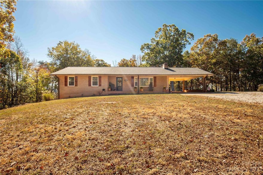 This 3-bedroom, 2-bathroom brick home on 9 acres of mostly cleared land in Sharon, South Carolina, offers the perfect blend of modern living and countryside tranquility. Recently renovated, it features a spacious interior, including a modern kitchen and comfortable living areas. Upgrades include new roof (2021), updated electrical, new doors & windows, gutters, and MORE! The fenced backyard ensures privacy, and a full unfinished basement offers customization options. Equestrian enthusiasts will love the vast acreage, perfect for horses. Additionally, the property includes a 2-car carport and a roomy shed for storage. Don't miss the opportunity to enjoy the best of both worlds—rural serenity and modern comfort in this charming Sharon home.